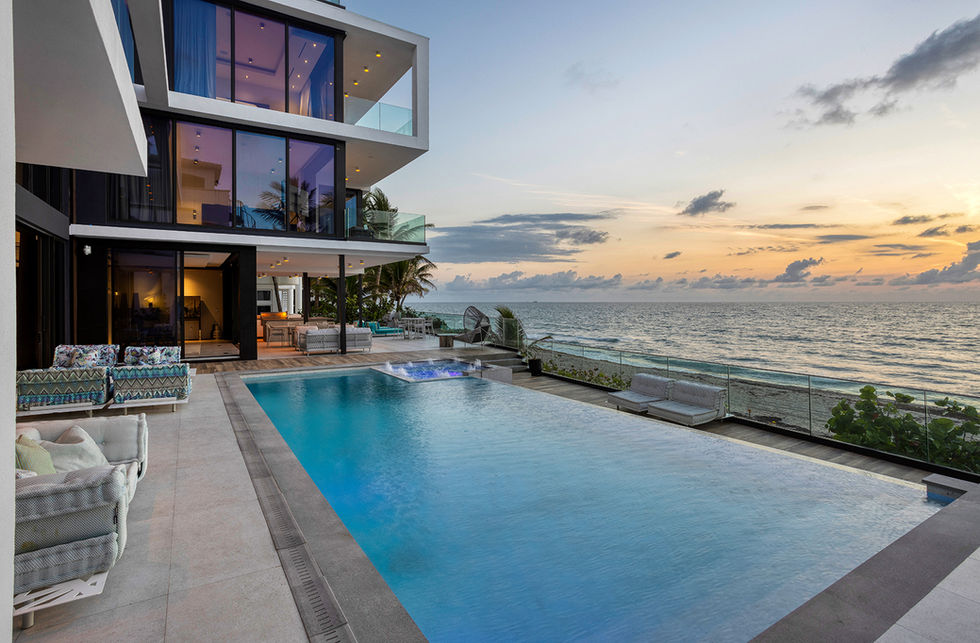 Infinity pool with ocean view at Highland Beach oceanfront residence, Florida