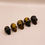 Thumbnail: Tiger's Eye Skulls a group of 5