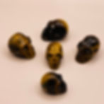 Tiger's Eye Skulls a group of 5