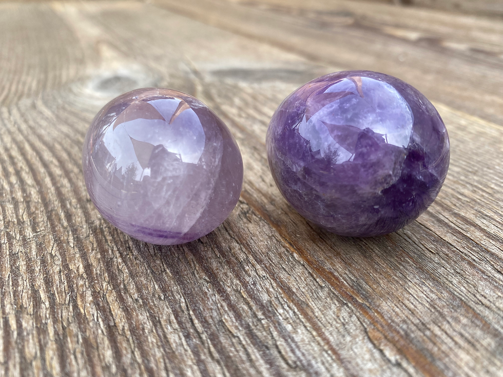 Thumbnail: Two egg-shaped amethyst crystal healing carvings