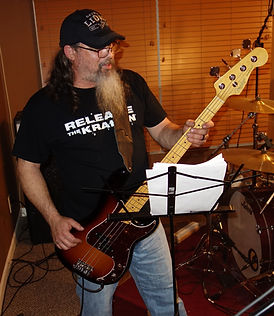 Kevin Skeet Kelly Bassist