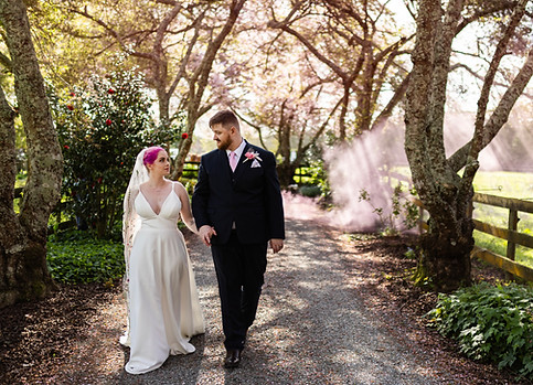 Wedding photography in Tamahere, couple on driveway with cinematic smoke, Waikato Wedding Photographer