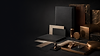 Premium black and bronze brand identity materials, stationery and packaging mockups