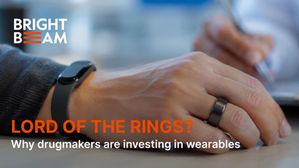 Hand wearing smart watch with text Lord of the Rings?