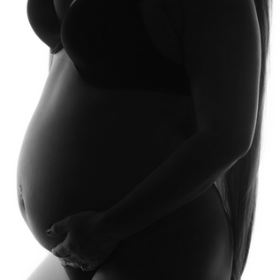 Close up pregnancy belly portrait in Bedford Texas maternity photography session