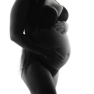 Fine art maternity profile portrait highlighting pregnancy shape in Bedford Texas