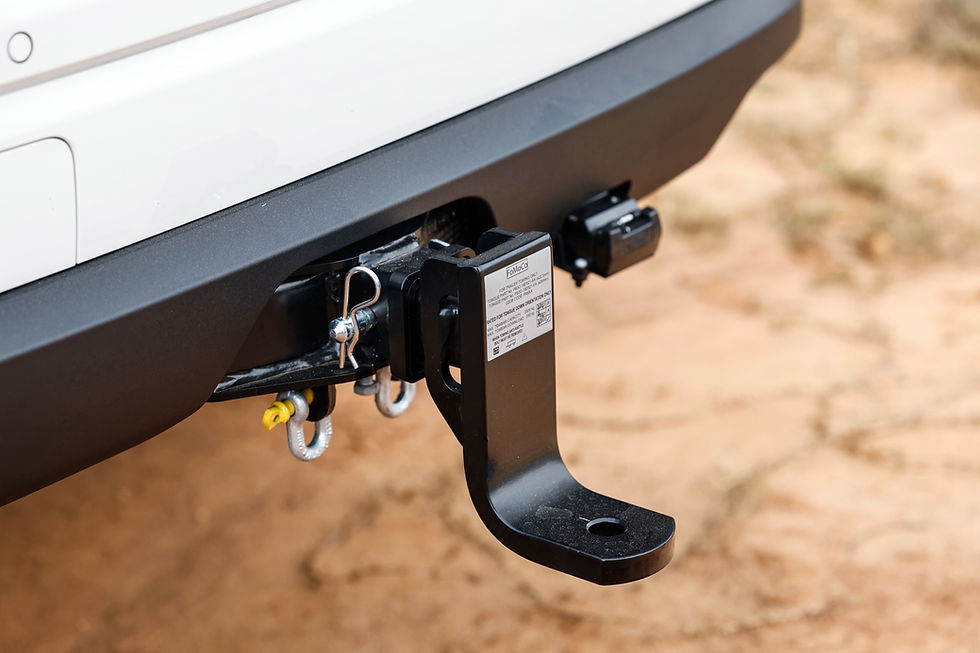 a tow hitch in a white SUV