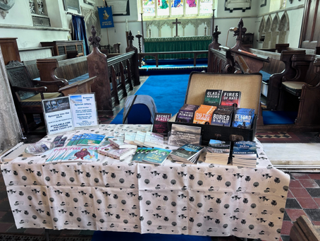 a table of books at a church 