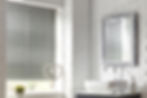 A timeless bathroom with modern and elegant Venetian blinds.