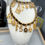 Thumbnail: Vintage leather woven 18k Gold P chain