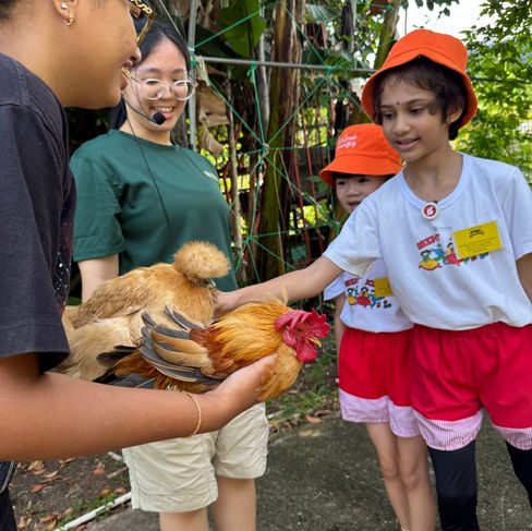 Kids learning composting with parents