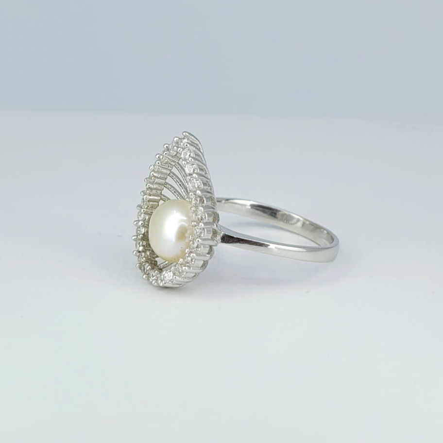 Silver ring with a white Pearl and White Topaz