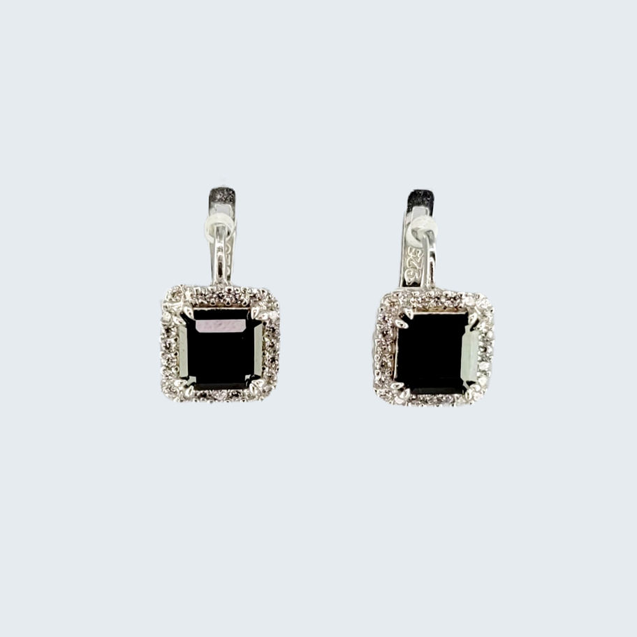 Silver earrings with an asscher cut black Onyx surrounded by white Topaz