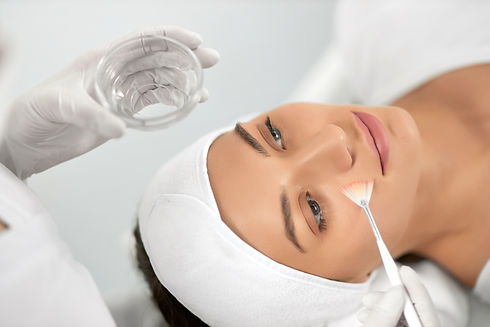 young-woman-doing-procedure-face-beautician.jpg