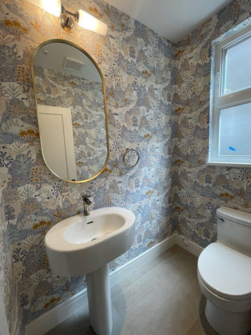 Elegant Bathroom with Floral Wallpaper