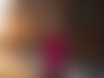 Confident woman in a bold maxi dress walking into a Toronto event