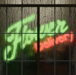 A rainy window with a neon sign shining through in the dark. The neon sign reads "Flower Delivery".