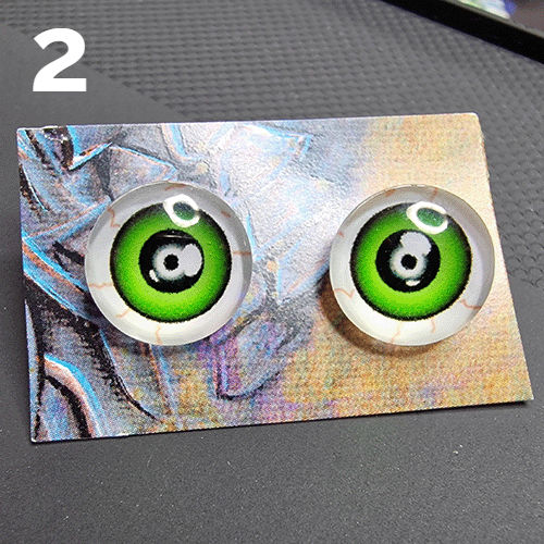Thumbnail: verschiedene Augen Ohrstecker