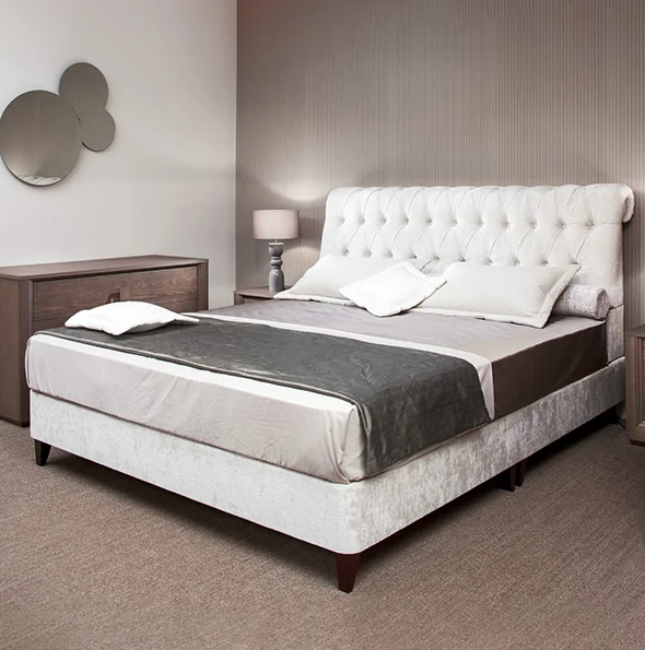 Ivory Velvet Fabric Bed – Tufted Charm with Tapered Legs