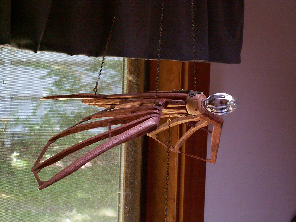 Kestrel wood glass and metal sculpture by Philip R Gauthir