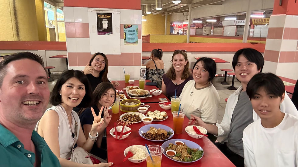 Enjoying SG's local cuisine at Chinatown Hawker Centre. Photo 2026 Xin Rui.