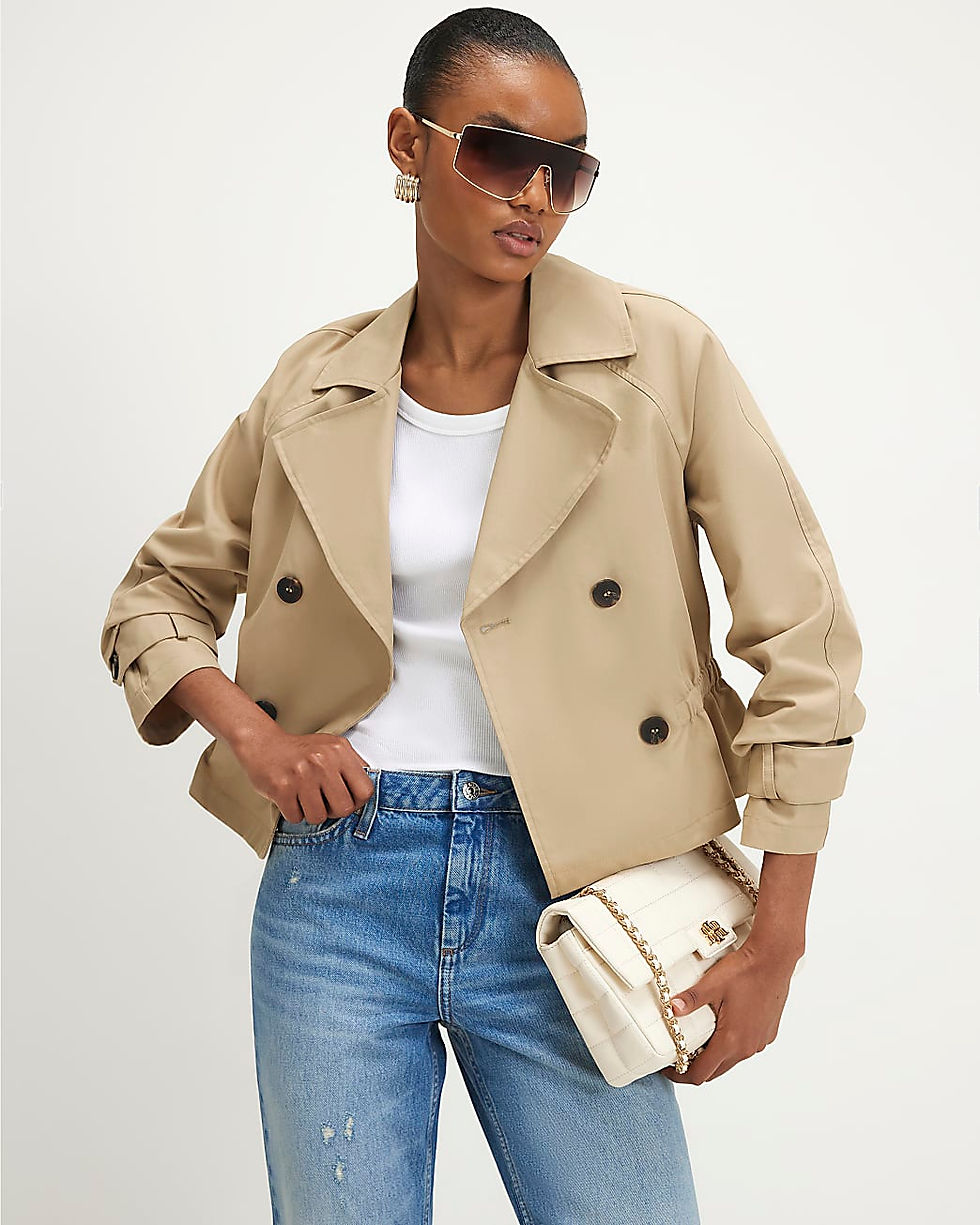 A lightweight trench jacket is an essential item for trans-seasonal style