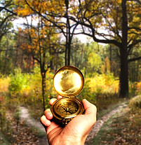 Hand Holding Gold Compass_edited.jpg
