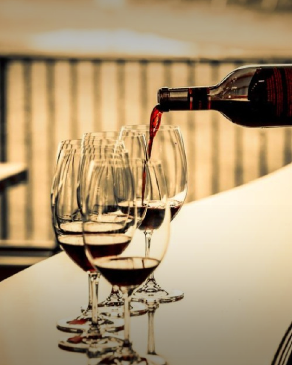 Pouring wine in a tasting room. Structure Before Software: Lessons from Ecommerce and Wine