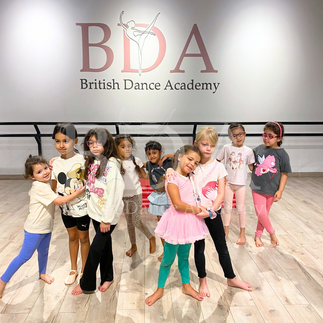 Kids posing at the end of their dance at Summer dance camp at British Dance Academy in Dubai. 