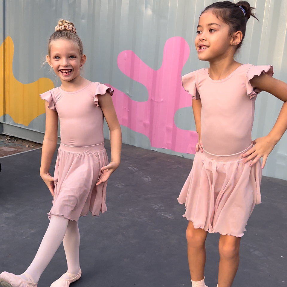 Dance students standing on the stage for a photo at the Ripe Market in Dubai participating in the British Dance Academy winter performances.