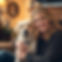 Warm, candid photo of pet loss grief coach in a cozy, inviting setting (not overly posed)