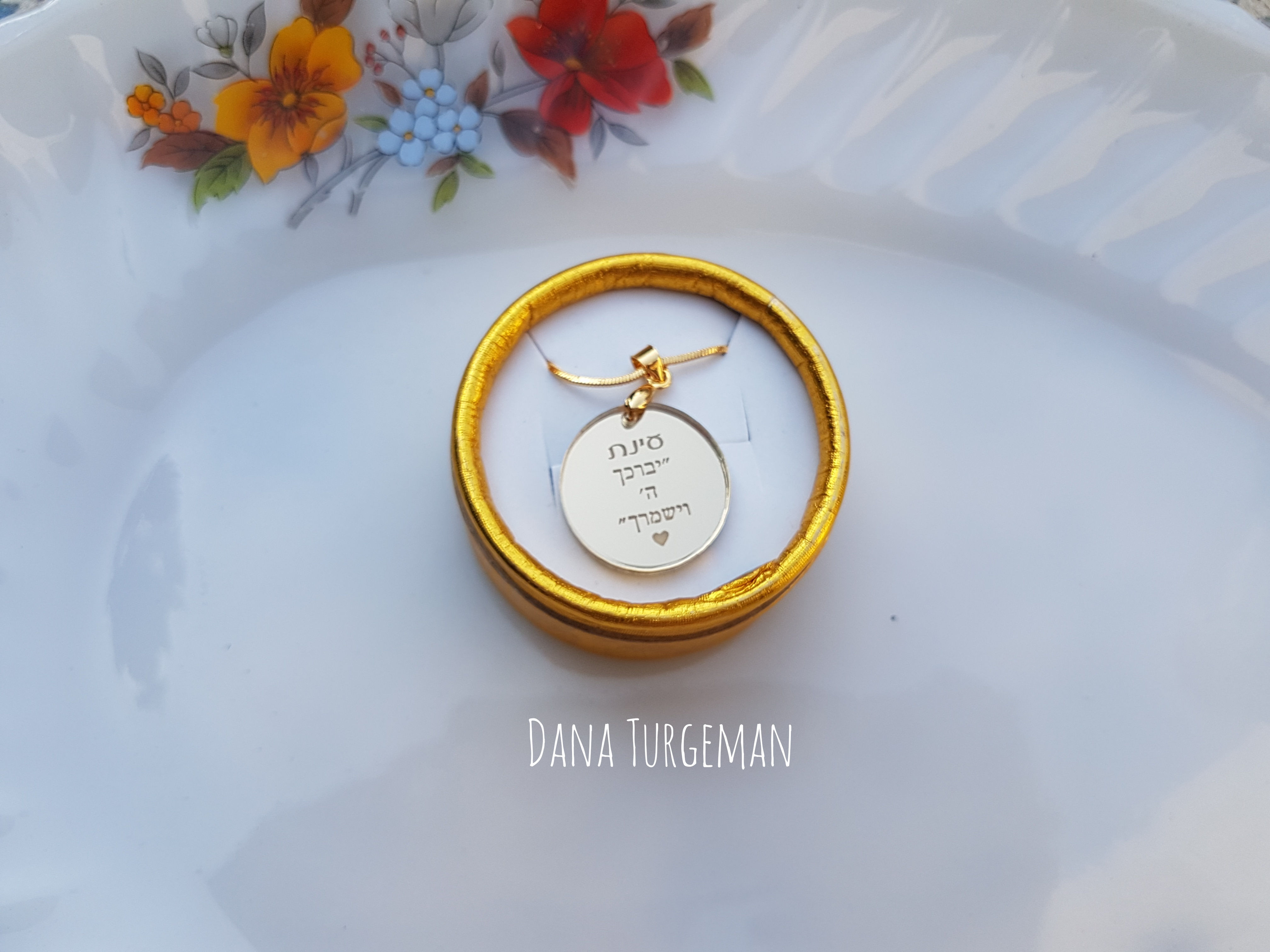 May God bless you and keep you, a necklace with an empowering engraving. Golden round pendant