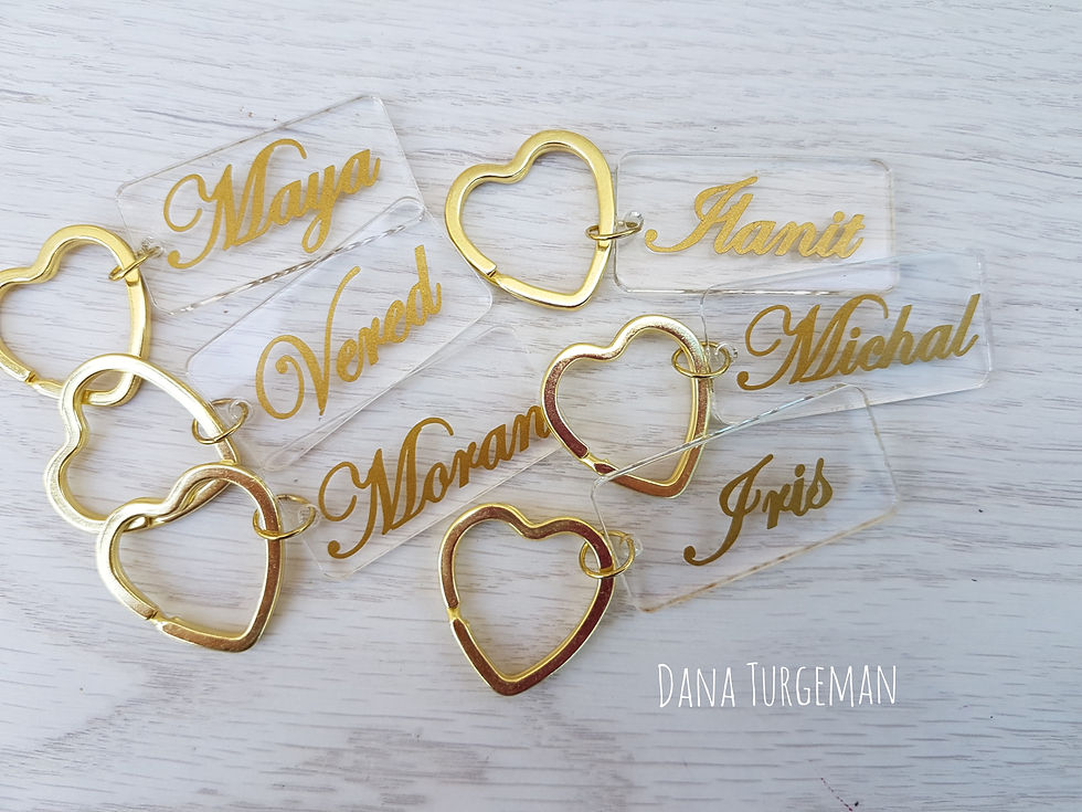 Thumbnail: Transparent key chain / name tag with golden lettering