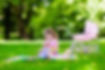 Family with children enjoying picnic out