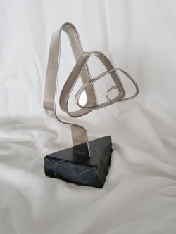 Jubiloso-Serpentinas Festivas 98 series,1995, stainless steel-marble, 10.5 x 6 x 4 in