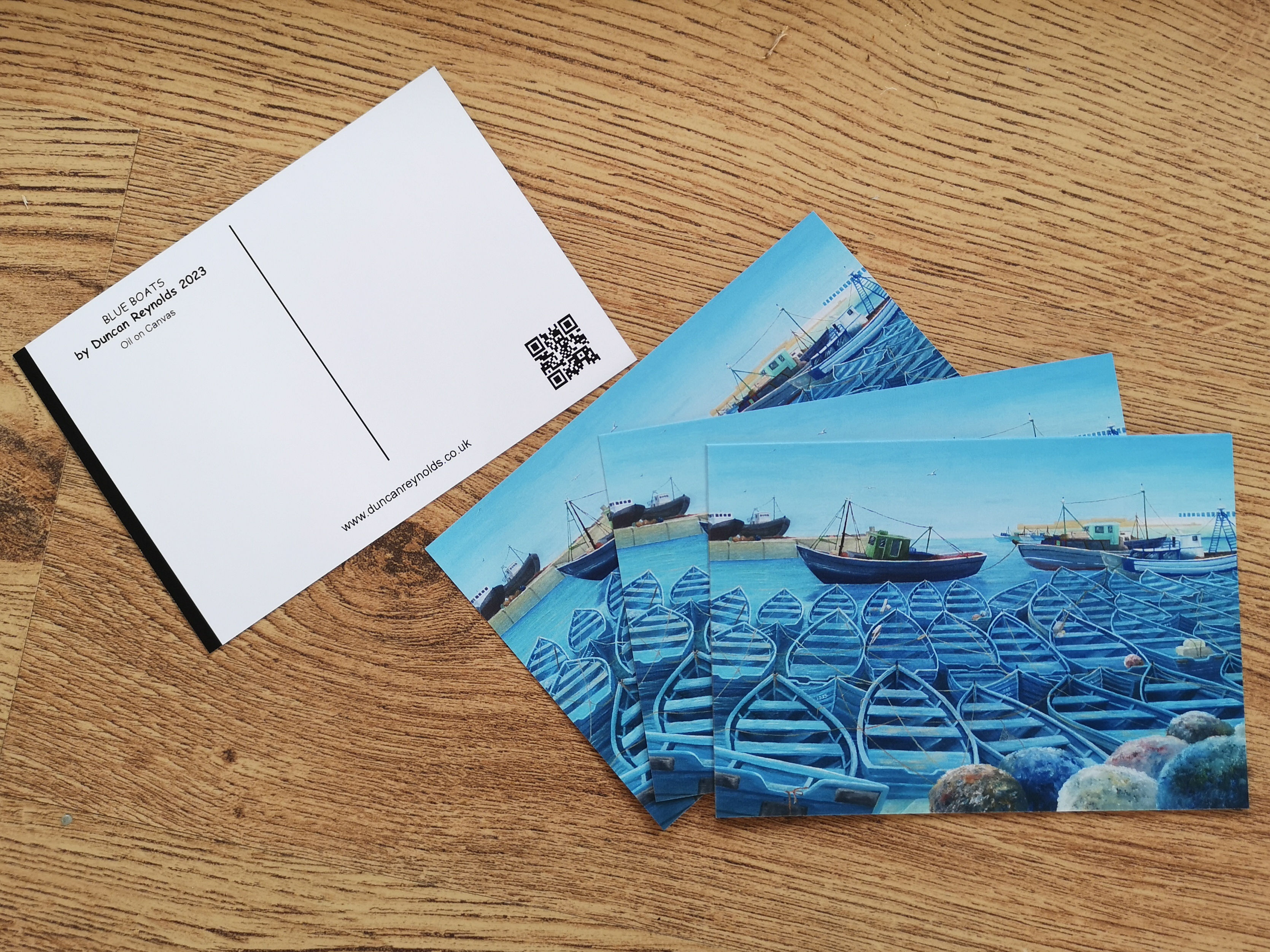 BLUE BOATS POSTCARD