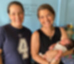 Dr. Karolyn with a mom and her newborn daughter
