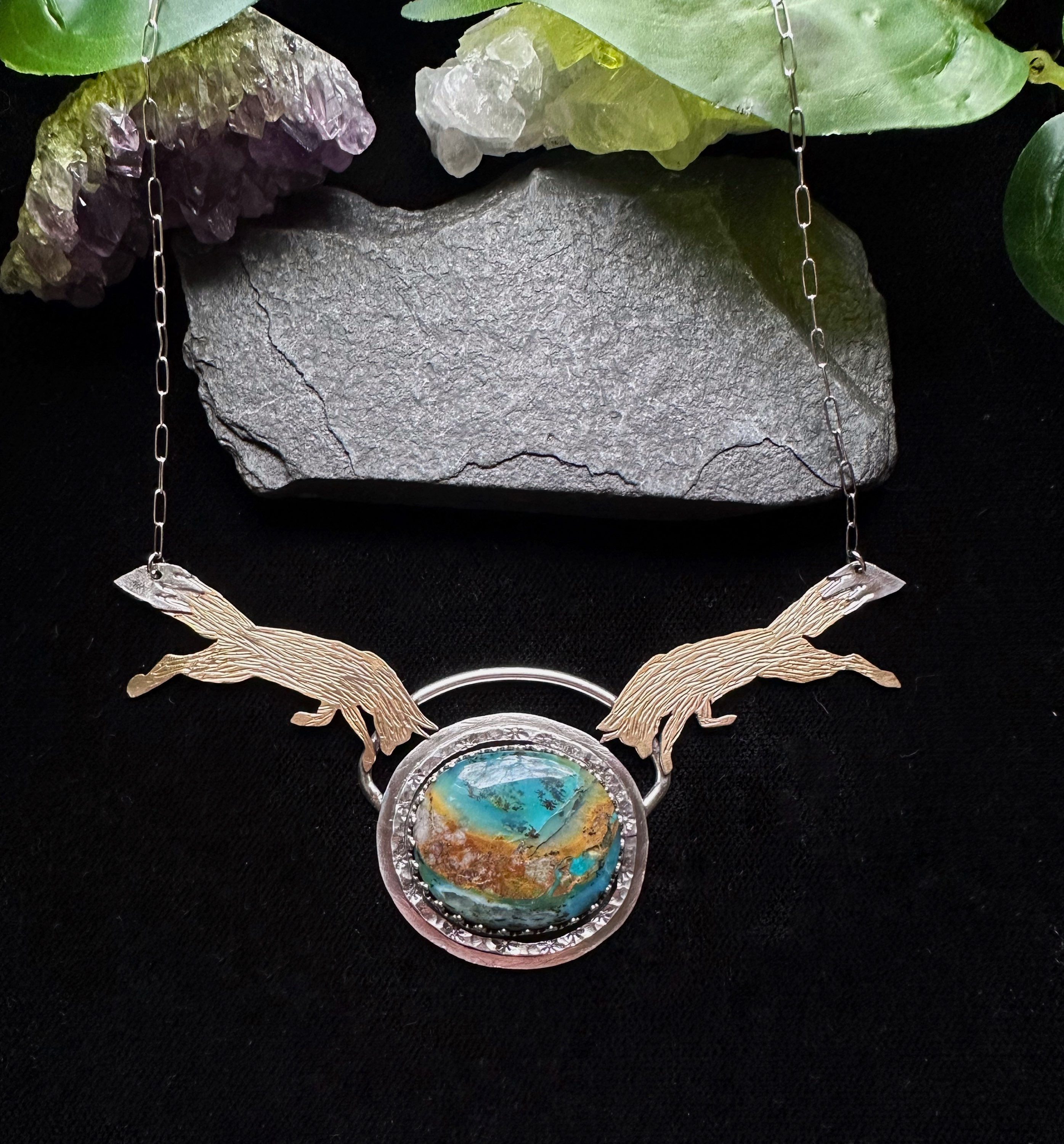 Andean Opal Pendant With Engraved Foxes