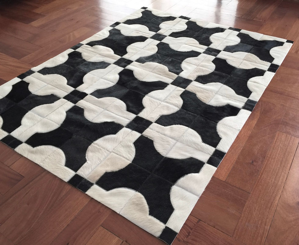 Thumbnail: Vicente hair-on hide patchwork rug with geometric circle and cross lattice