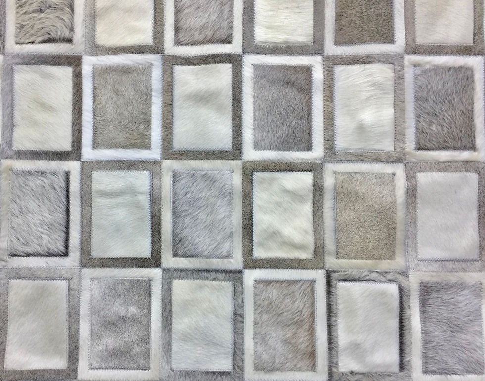 Thumbnail: Belgrano cowhide patchwork rug with framed square design filling the floor