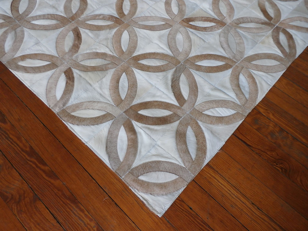 Thumbnail: Custom Argentine cowhide San Telmo rug with contemporary circle rings pattern