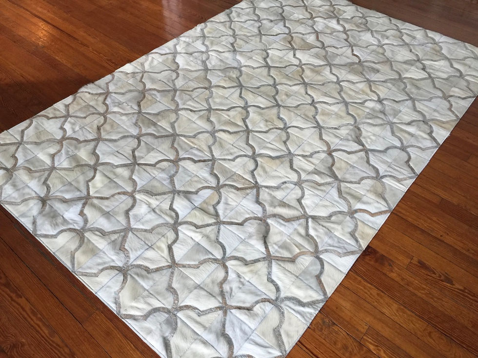Thumbnail: Custom Argentine Acassuso cowhide rug with elegant fleur de lis design