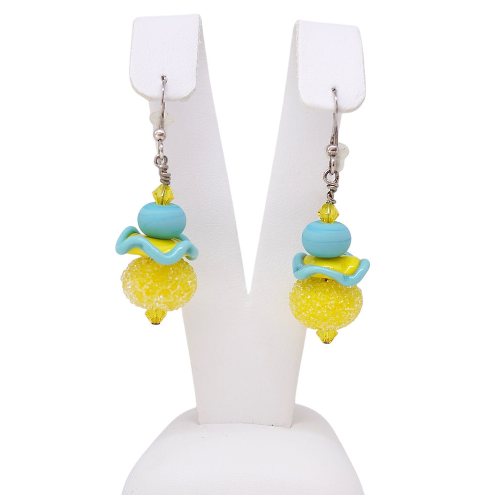 Thumbnail: Yellow sugar lampwork bead earrings on earring display