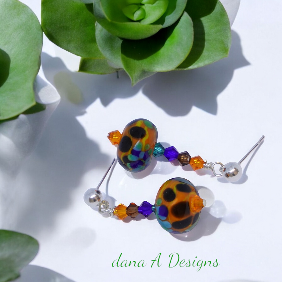 Thumbnail: Lampwork earrings near succulent plant