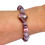 Thumbnail: Purple lampwork bracelet on a woman's wrist