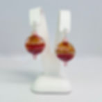 Lampwork bead earrings on earring display
