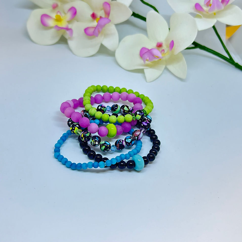 Thumbnail: colorful gemstone bracelets near Orchids