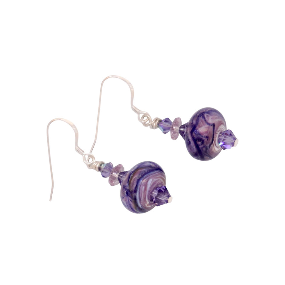 Thumbnail: purple swirl lampwork bead earrings laying flat on a white background