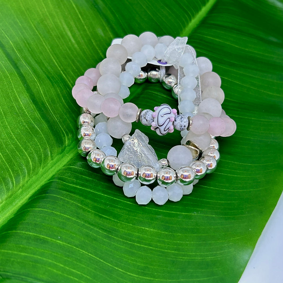 Thumbnail: gemstone bracelets on a green leaf