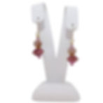 Pink lampwork beaded earrings on earring display